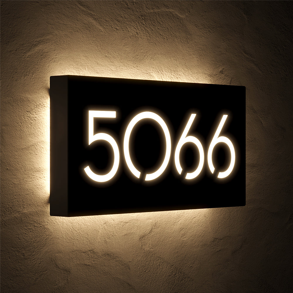 Large Number LED House Sign with 5963 shown at an angle in warm white backlighting