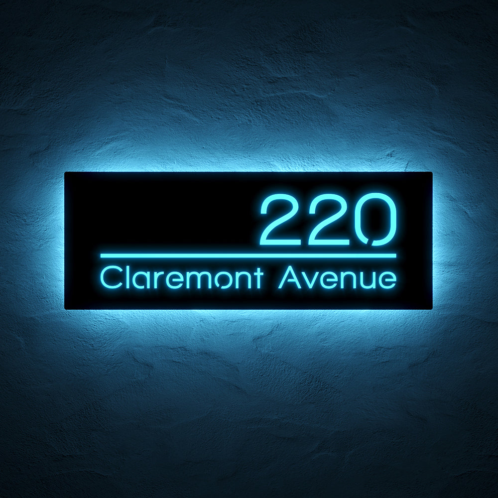 Line Design LED Address Sign with Street Name with 220 Claremont Avenue in ice blue backlighting