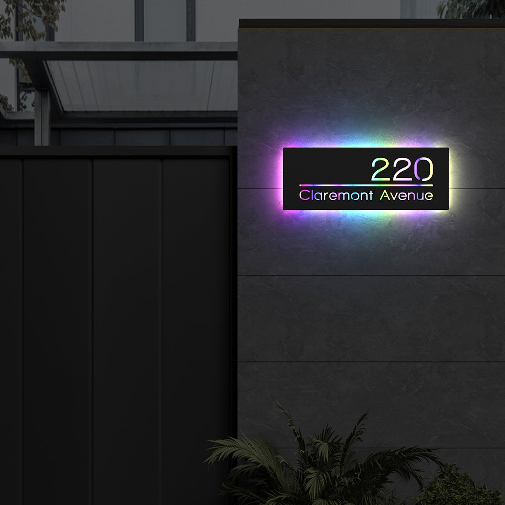 Line Design RGB LED Address Sign with Street Name with 220 Claremont Avenue displayed in multicolor RGB lighting