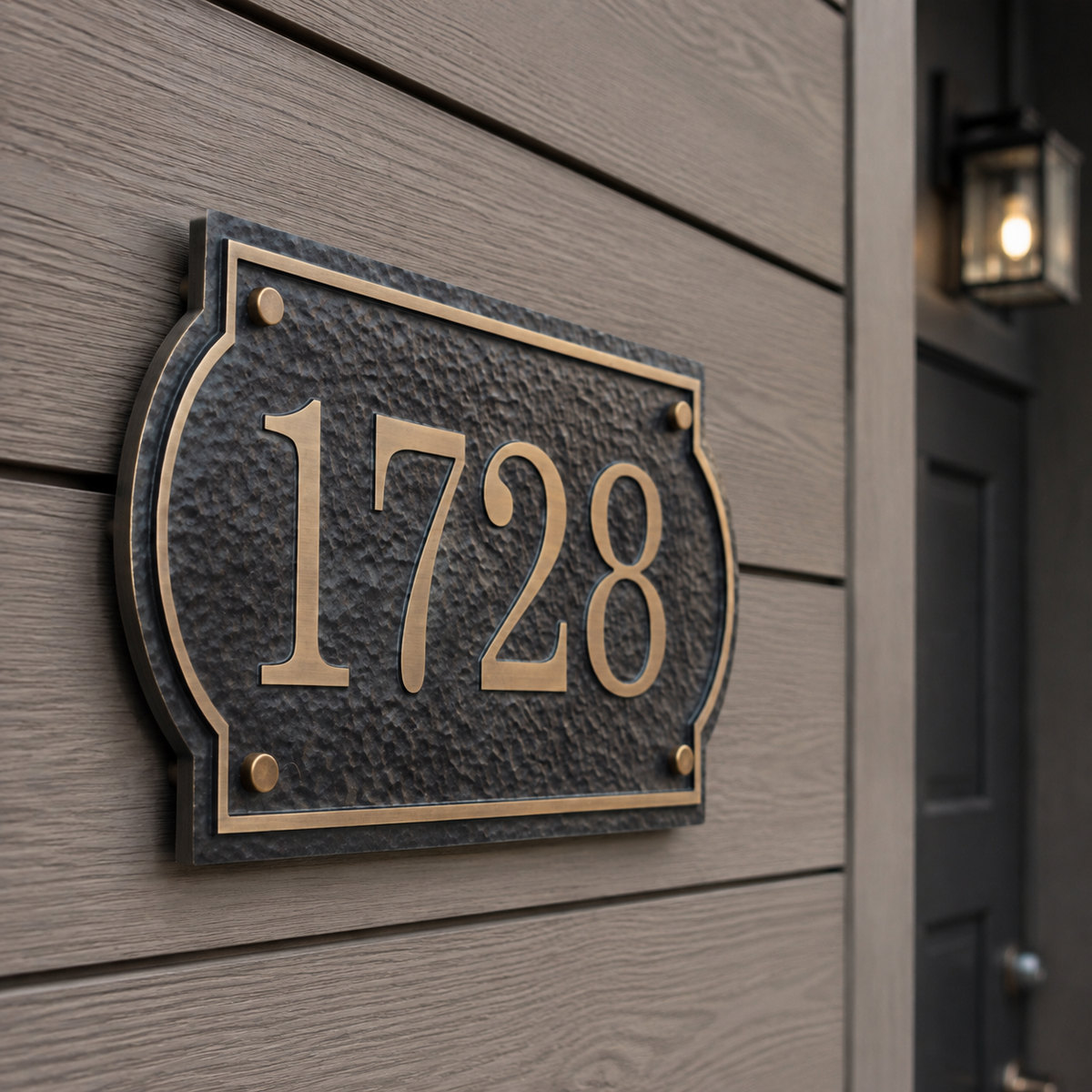 Custom number plaque 1728 mounted on horizontal house siding